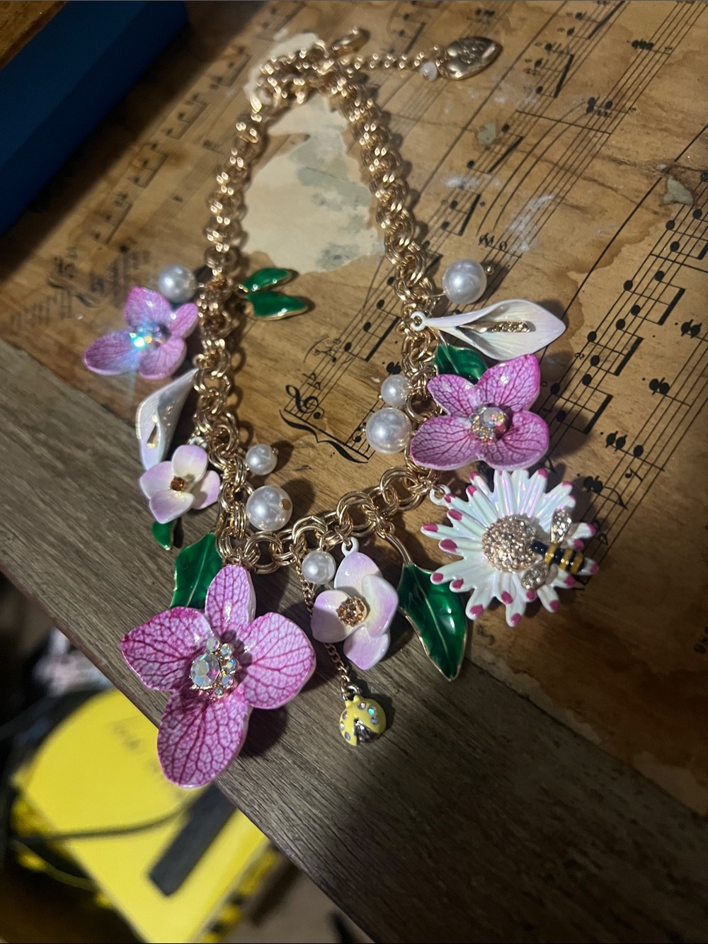 Betsey Johnson orchid, daisy and calla lily necklace!